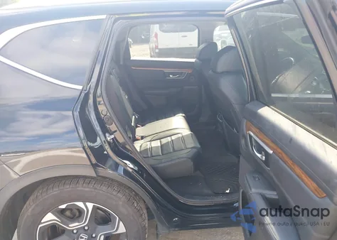 2018 Honda Cr-V Touring z USA, uszkodzony, nr VIN 7FARW2H93JE047695